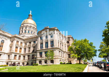 Atlanta, USA - April 20, 2018: Exterior state capitol building in Georgia with green park entrance and golden dome Stock Photo