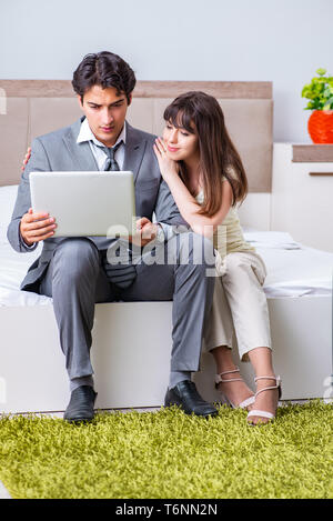 The wife seeing her husband off to business trip Stock Photo