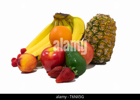 Fresh organic fruit isolated on a bright white background. Whole food, plant based, clean eating and vegan lifestyles Stock Photo