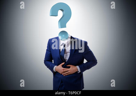 Businessman with question mark instead of head Stock Photo