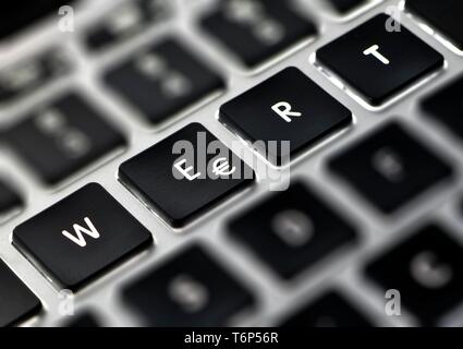 Symbol picture online shopping, lettering WERT with Euro sign on computer keyboard, Baden-Wurttemberg, Germany Stock Photo