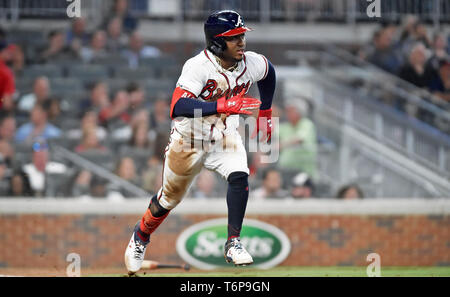 Atlanta Braves' Ozzie Albies watches his three-run home run during the  eighth inning of the team's baseball game against the Philadelphia  Phillies, Saturday, July 24, 2021, in Philadelphia. (AP Photo/Chris Szagola  Stock