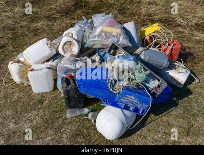 20 April 2019, Denmark, Lönstrup: Plastic waste that was previously collected from the beach of the North Sea on the west coast lies on a heap at the edge of the dunes for collection. Photo: Patrick Pleul/dpa-Zentralbild/ZB Stock Photo