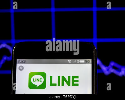 In this photo illustration a Line Corporation, Ltd. logo seen displayed ...