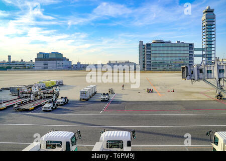 Kansai region, Osaka, Japan - 4 Mar 2018: Local specialist air plane staff is working and meeting on the field in the afternoon at Kansai Internationa Stock Photo