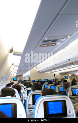 Aircraft cabin full of passengers Stock Photo: 31848323 - Alamy