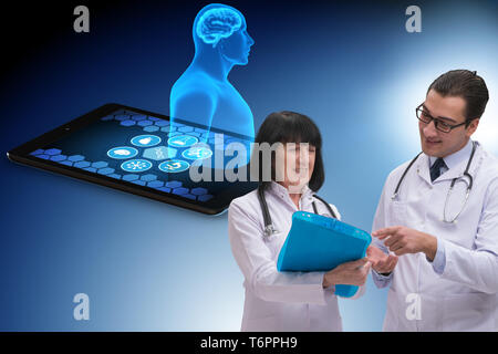 Two doctors in telemedicine concept Stock Photo