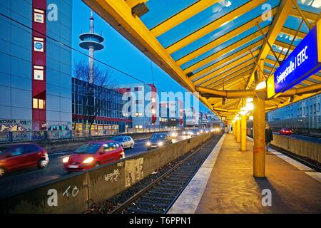 Subway stop Savignystrasse/ETEC directly next to the motorway A 40 at dusk, Essen, Ruhr Area, North Rhine-Westphalia, Germany Stock Photo