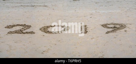 Panorama year '2019' number marking on the sand at the beach Stock Photo