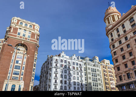 Palacio de la Prensa building (left) on Plaza del Callao in Madrid, Spain, view with Adriatica building on right Stock Photo