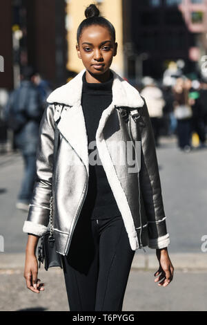 Milan, Italy - February 24, 2019: Street style – outfit after a fashion show during Milan Fashion Week - MFWFW19 Stock Photo