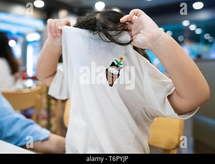 Little girl play halloween trick and treat with her suit. Stock Photo