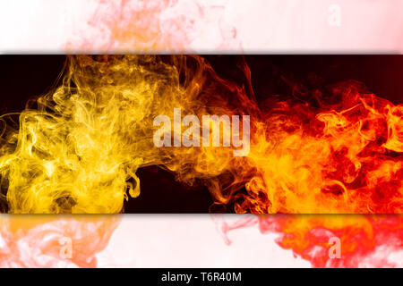 Frozen abstract movement of  explosion smoke multiple colors yellow and orange  on black and white  background. Background from the smoke of vape Stock Photo