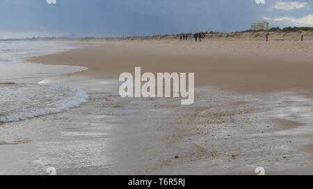The beach at Praia Verde on a cloudy spring day Stock Photo