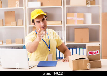 Handsome contractor working in box delivery relocation service Stock Photo
