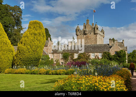 CAWDOR, NAIRN, SCOTLAND, UK - AUGUST 07, 2017: Front of Cawdor Castle with turret and drawbridge with bell and Stags Head Buckel Be Mindfull emblem. T Stock Photo