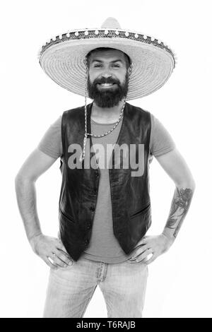 Man bearded cheerful guy wear sombrero mexican hat. Mexican party concept. Celebrate traditional mexican holiday. Lets have fun. Mexican guy happy festive outfit ready to celebrate. Stock Photo