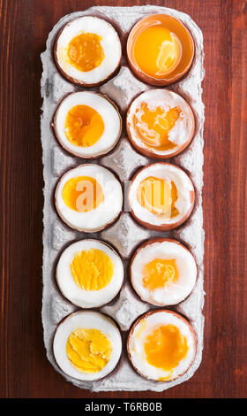eggs in varying degrees of availability depending on the time of boiling eggs Stock Photo