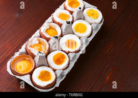 eggs in varying degrees of availability depending on the time of boiling eggs Stock Photo