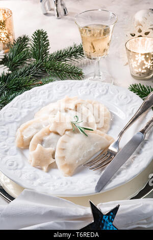 Polish style dumplings filled with sauerkraut and mushrooms Stock Photo