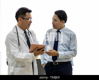 Doctor using tablet Stock Photo