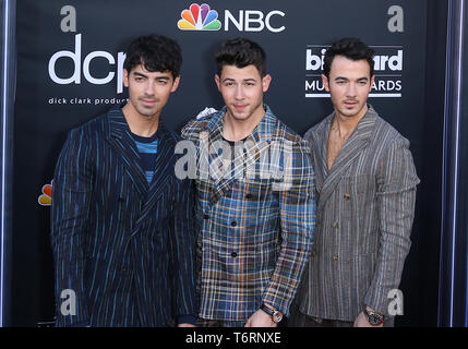 May 1, 2019 - Las Vegas, NV, U.S. - 01 May 2019 - Las Vegas, NV - Jonas Brothers.  2019 Billboard Music Awards at MGM Grand Garden Arena, Arrivals. Photo Credit: mjt/AdMedia  (Credit Image: © Wes Eddy/AdMedia via ZUMA Wire) Stock Photo