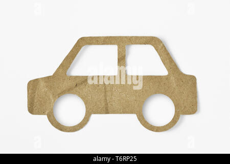 Recycled paper cut of car on white background - Eco-friendly car concept Stock Photo