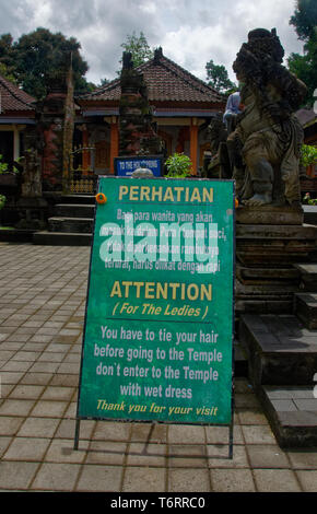 Sign in Bahasa  and English giving instructions to worshippers bathing at the Pura Titra Empul in Ubud, Bali, Malaysia Stock Photo