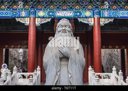 Statue of Confucius in Confucius Temple and The Imperial College Museum in Beijing, China Stock Photo