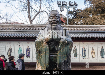 Statue of Confucius in Confucius Temple and The Imperial College Museum in Beijing, China Stock Photo