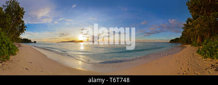 Sunset on tropical beach - Seychelles Stock Photo