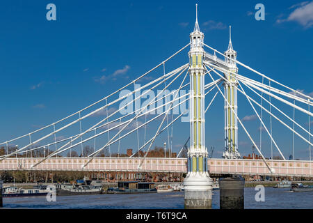The Albert Bridge, built in 1873, which connects Chelsea on the north side of the River Thames, to Battersea on the south side, London, UK Stock Photo