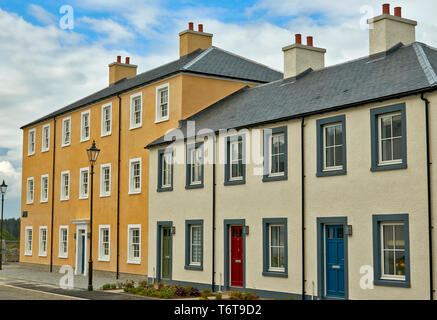 TORNAGRAIN INVERNESS SCOTLAND PLANNED HAMLET OR VILLAGE LARGE HOUSE AND ONE WITH THREE COLOURED DOORS Stock Photo