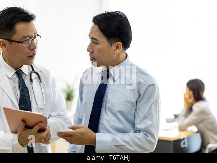 Doctor using tablet Stock Photo