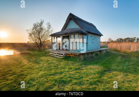 A thatched cottage near Martham on the Norfolk Broads Stock Photo