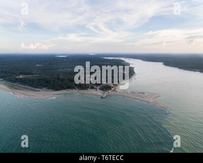 aerial view of a coastal area where freshwater from a river meet a salt water located in mek mas beach,kelantan,malaysia Stock Photo