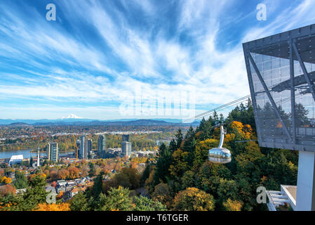 Portland Aerial Tram with a view of Portland, Oregon with Mt. Hood in the background Stock Photo