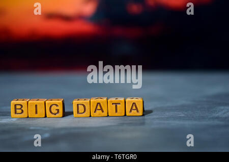 Big data on wooden blocks. Cross processed image with bokeh background Stock Photo