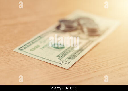 Ukrainian coins in a hundred dollar denomination on a light brown background. 2019 Stock Photo