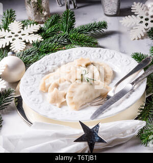 Polish style dumplings filled with sauerkraut and mushrooms Stock Photo