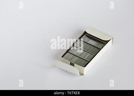 stapler wire in paper box on white background Stock Photo