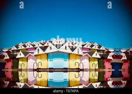 Abstract image created with a kaleidoscope filter. Mirror image beach huts at Walton on the Naze, Essex, UK. Stock Photo