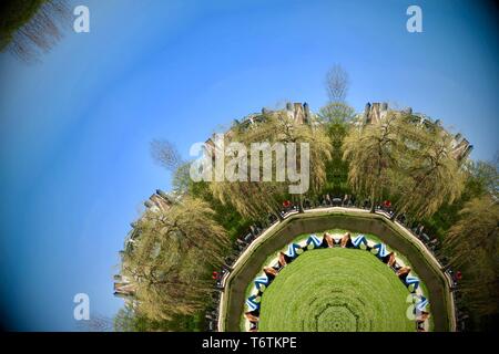 Abstract image created with a kaleidoscope filter. Vondelpark in Amsterdam, Netherlands. Stock Photo