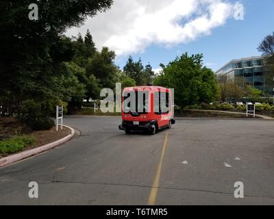 Driverless shuttle from self driving vehicle company Easy Mile driving through the Bishop Ranch office park in San Ramon, California, the first fully autonomous shuttle bus authorized to drive on public roads in the State of California, April 16, 2019. () Stock Photo