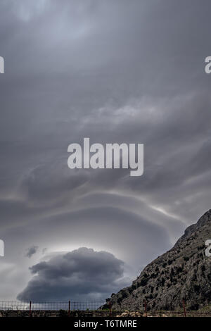Strange clouds on the stormy sky Stock Photo