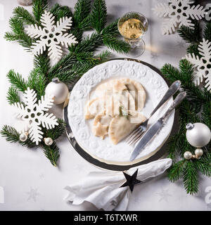 Polish style dumplings filled with sauerkraut and mushrooms Stock Photo