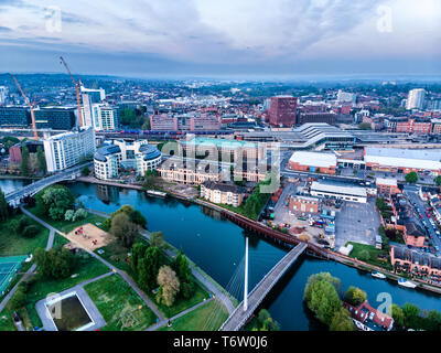 Aerial photograph of Reading, Berkshire, UK, taken at sunrise, including the River Thames. Looking East showing Reading and Christchurch footbridge Stock Photo