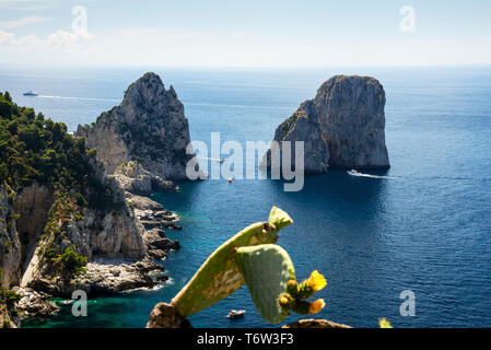Faraglioni stacks off the coast of Capri, Italy. Stock Photo