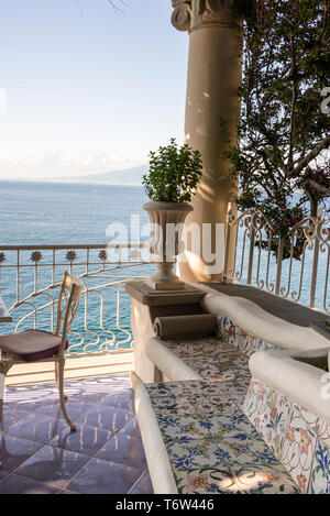 Ceramic tile bench and the Bay of Naples in Sorrento, Italy. Stock Photo