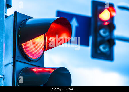 Traffic lights over urban intersection. Red light Stock Photo - Alamy